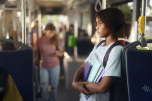 A student, lost in thought or grappling with depression, rode the public transport